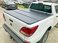 TAPA RIGIDA PLEGABLE EXTANG SOLID FOLD - MAZDA BT-50 DOBLE CABINA 2013-