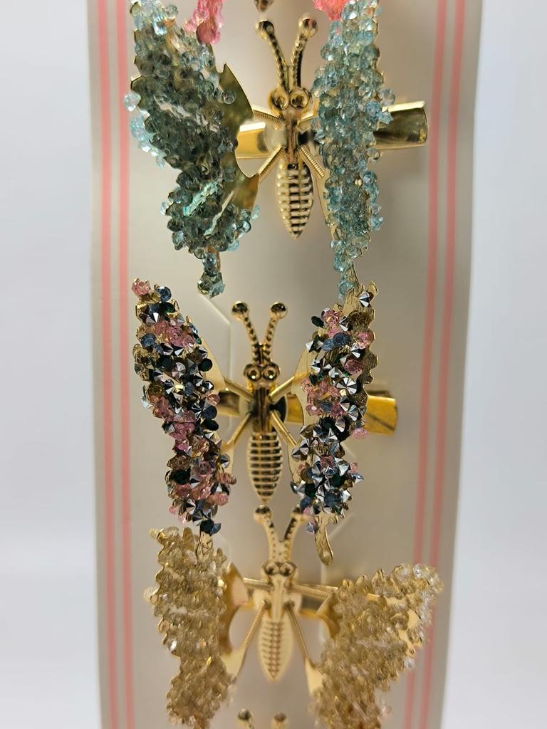 PINZA RESORTE MARIPOSA -